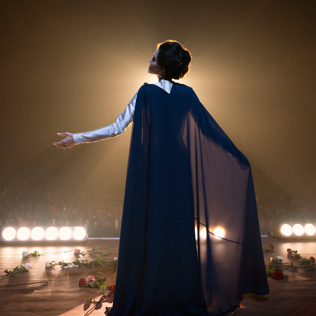 A screenshot of Angelina Jolie as Maria Callas in a movie. 