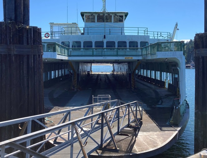 Old ferry sitting at a dock