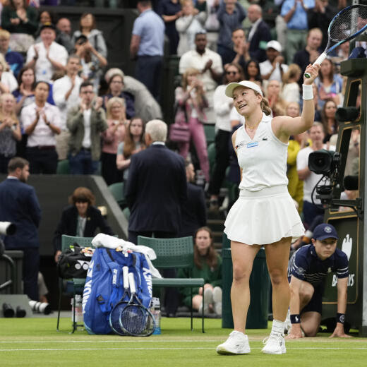 Lulu Sun of New Zealand celebrates after defeating Emma Raducanu of Britain in their fourth round match at the Wimbledon tennis championships in London, Sunday, July 7, 2024. (AP Photo/Alberto Pezzali)