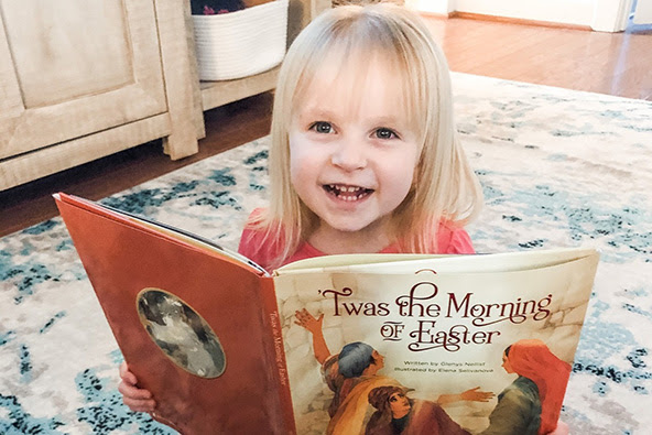 Photo of child holding "'Twas the Morning of Easter."