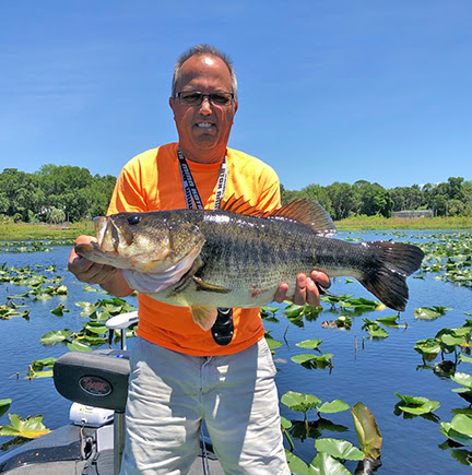 Angler holding trophy Florida bass