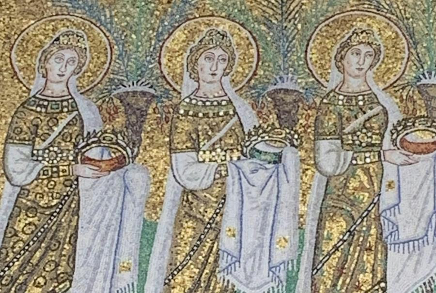 A mosaic depicts three women with halos around their heads, each holding a pot in her hands.