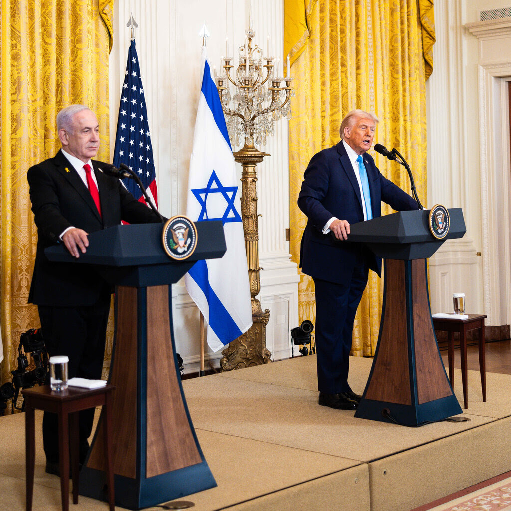 President Trump and Prime Minister Benjamin Netanyahu standing behind lecterns in the White House.