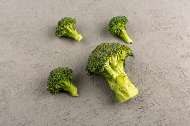 top view green broccoli fresh ripe isolated on the grey