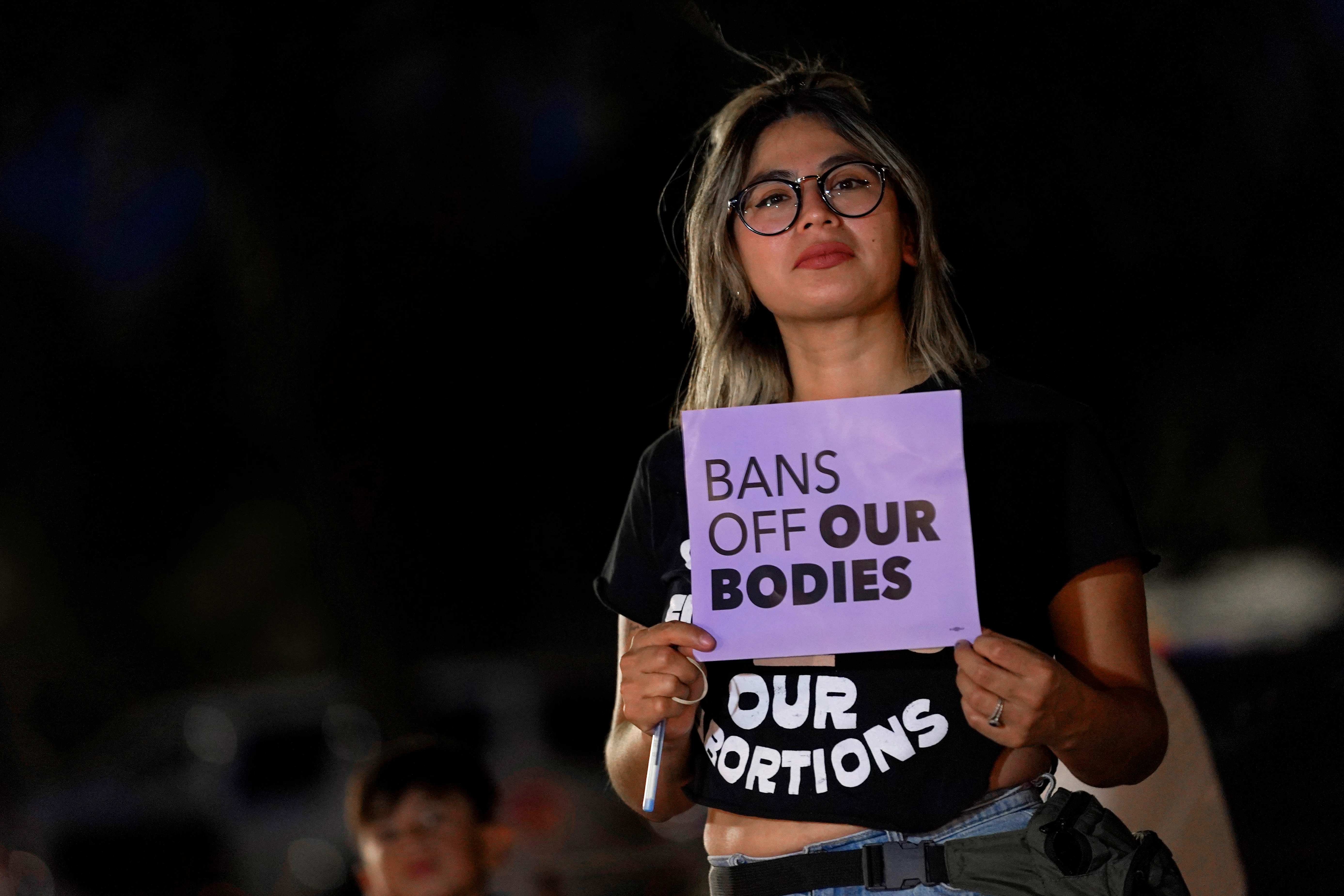 This file photo shows Celina Washburn at a protest in 2022, outside the Arizona Capitol in Phoenix to voice her opposition to an abortion ruling.