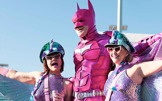 People dressed in glitter at a music festival
