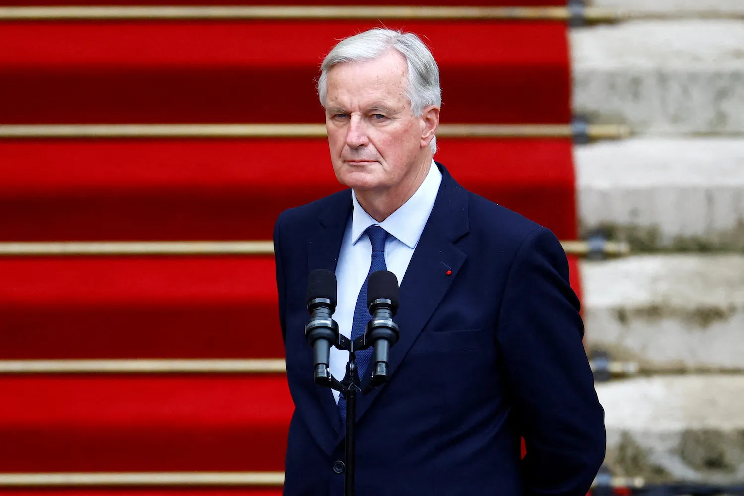 Newly appointed French Prime Minister Michel Barnier is seen at the handover ceremony in Paris.