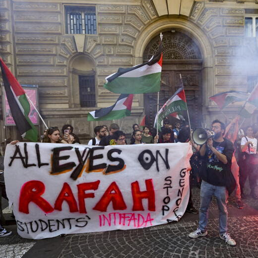 epa11331112 Members of the group Student Network for Palestine protest outside the headquarters of an Israeli shipping and logistics company, in Naples, Italy, 10 May 2024. Students painted the slogan 'All eyes on Rafah' on the street outside the company's headquarters to express their support for Palestinian people. EPA/CIRO FUSCO