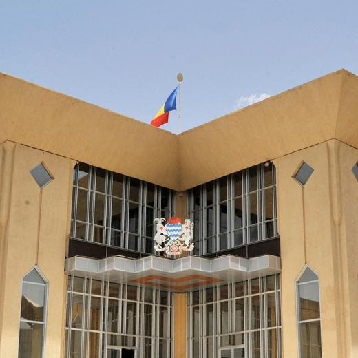 (FILES) A picture taken on June 18, 2013 shows a view of the Presidential Palace with the coat of arms in the Chadian capital N'djamena. Fighting between security forces and gunmen who launched an assault on Chad's presidential palace on January 8, 2025, left 19 people dead, including 18 of the attackers, the government said. (Photo by Issouf SANOGO / AFP)