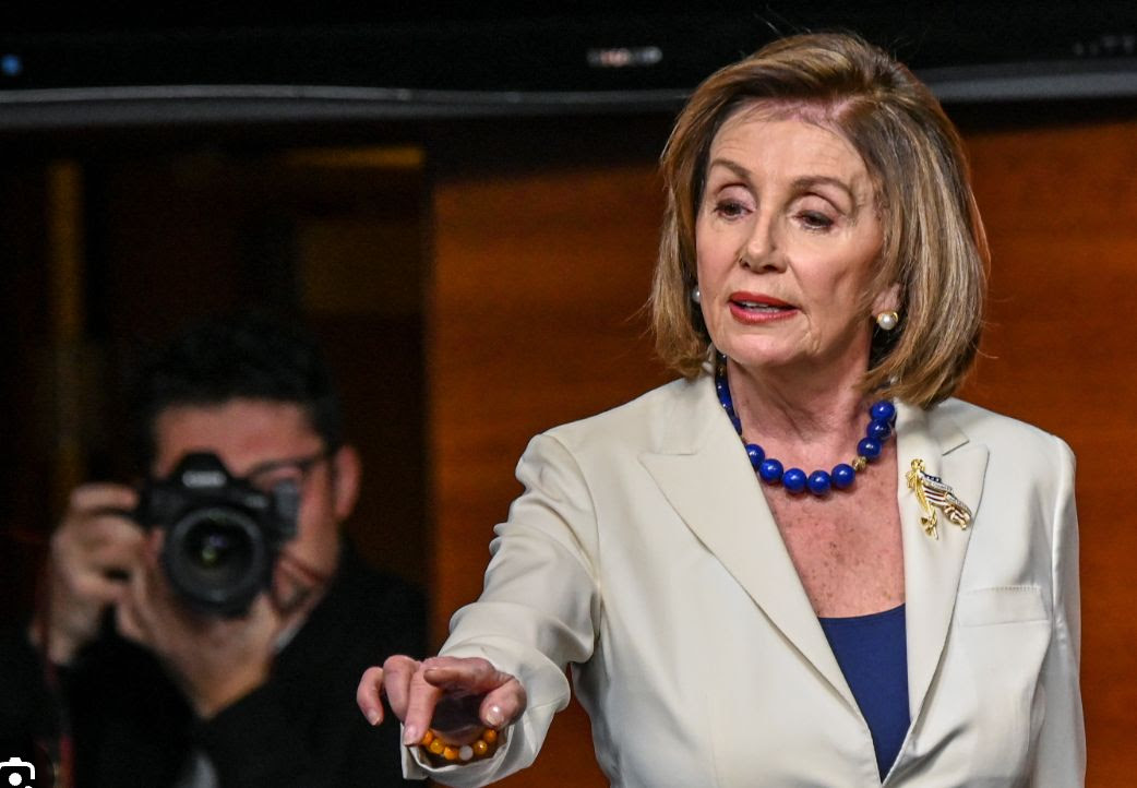 Nancy Pelosi pointing
