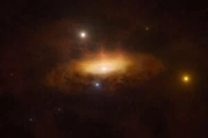 A galaxy suddenly became much brighter in late 2019. This reveals a giant black hole at its center that's woken up and started feeding on surrounding gas, making the whole galaxy light up. This is the first time scientists have observed this awakening happen.