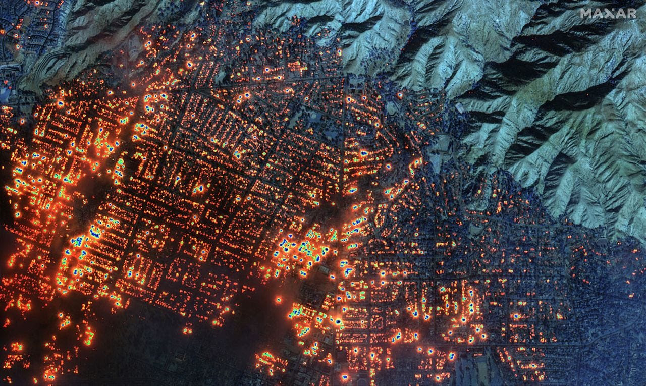A satellite image shows the Eaton wildfire has set nearly every building in western Altadena on fire. A satellite image shows the Eaton wildfire has set nearly every building in western Altadena on fire.
