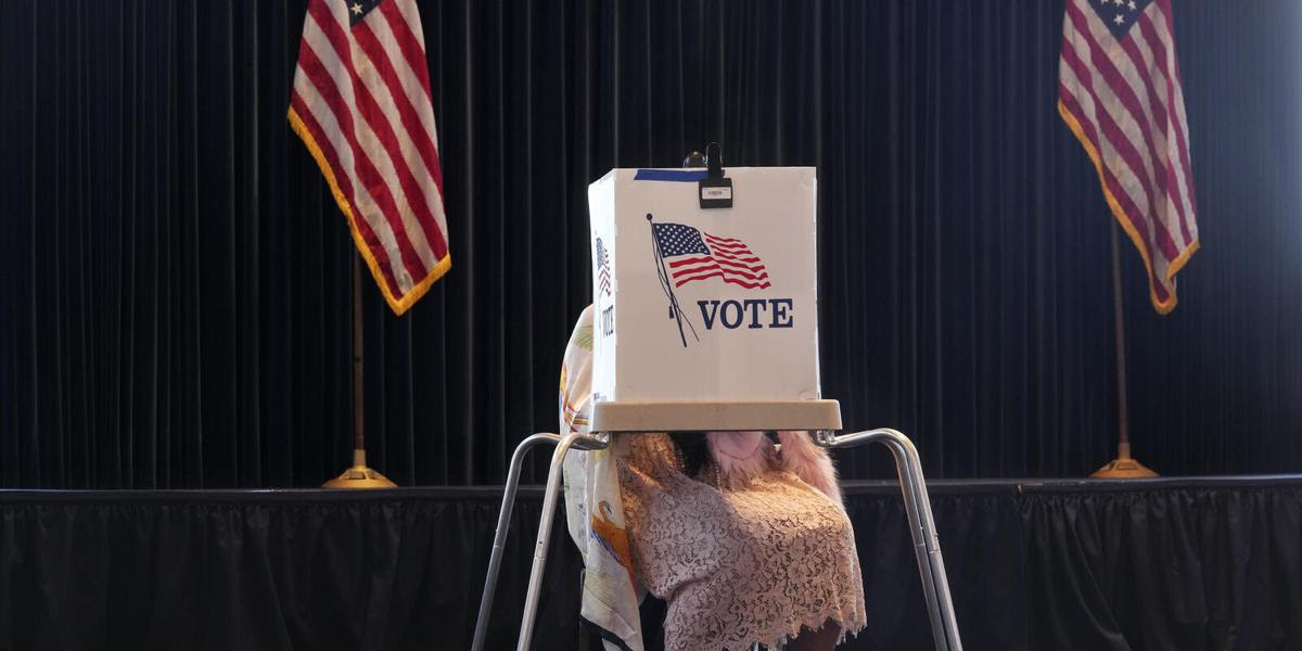 A voter works on her ballot at a polling place at the Ronald Reagan Presidential Library on Election Day, Tuesday, Nov. 5, 2024, in Simi Valley, Calif. (AP Photo/Chris Pizzello)