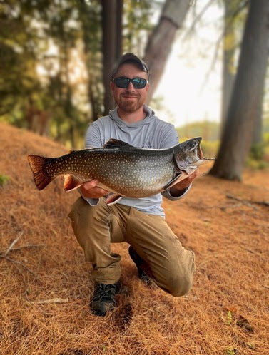 Benjamin Ferguson holding the new State record brook trout Benjamin Ferguson holding the new State record brook trout