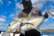 Ulua angler Cory Olores is one of many fishermen tagging popular game fish with Pacific Islands Fisheries Group’s Tag It program.