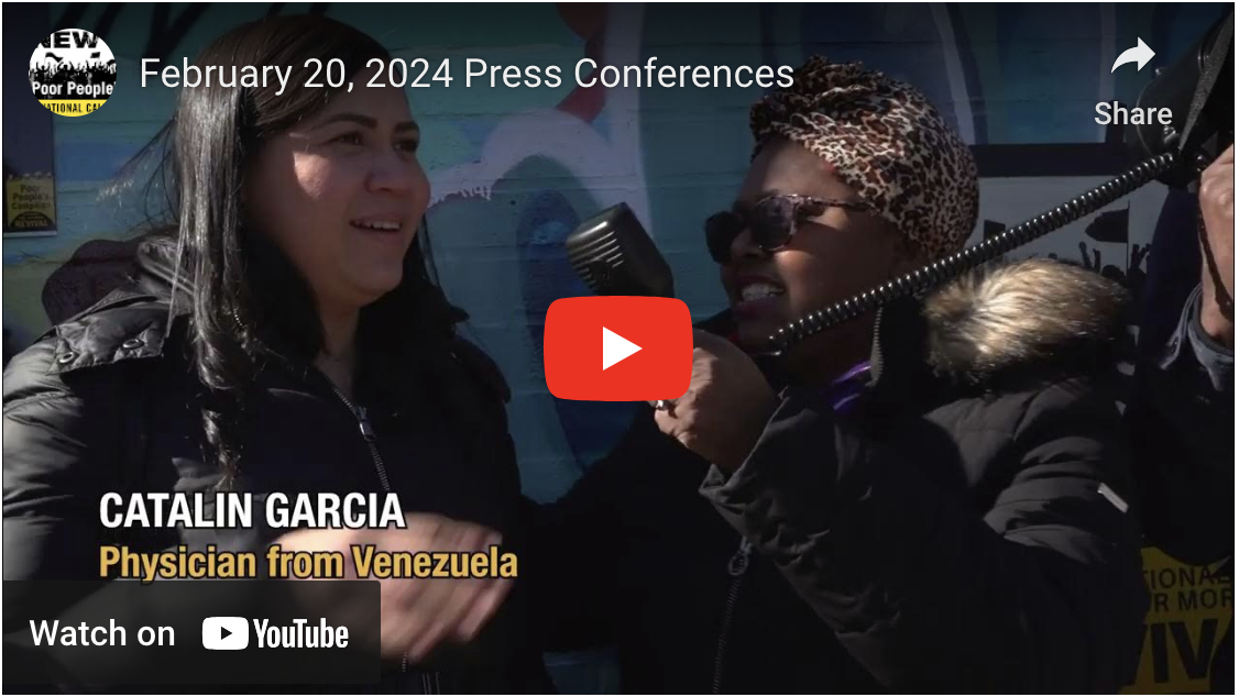Screenshot of YouTube video titled February 20, 2024 Press Conferences. A person with long brown hair speaks into a megaphone above text saying Catalin Garcia, physician from Venezuela.