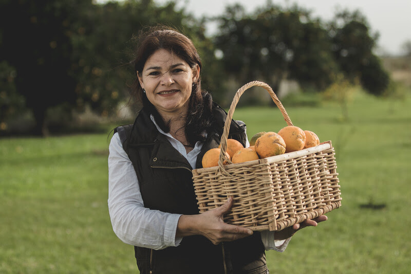 Viviana Pavon with the primary ingredient of her beloved jams. Photo credit: Terrier Films