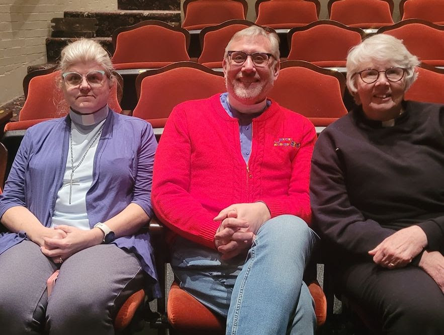 Three clergy sit side-by-side at a recent Manitowoc School Board candidates debate.