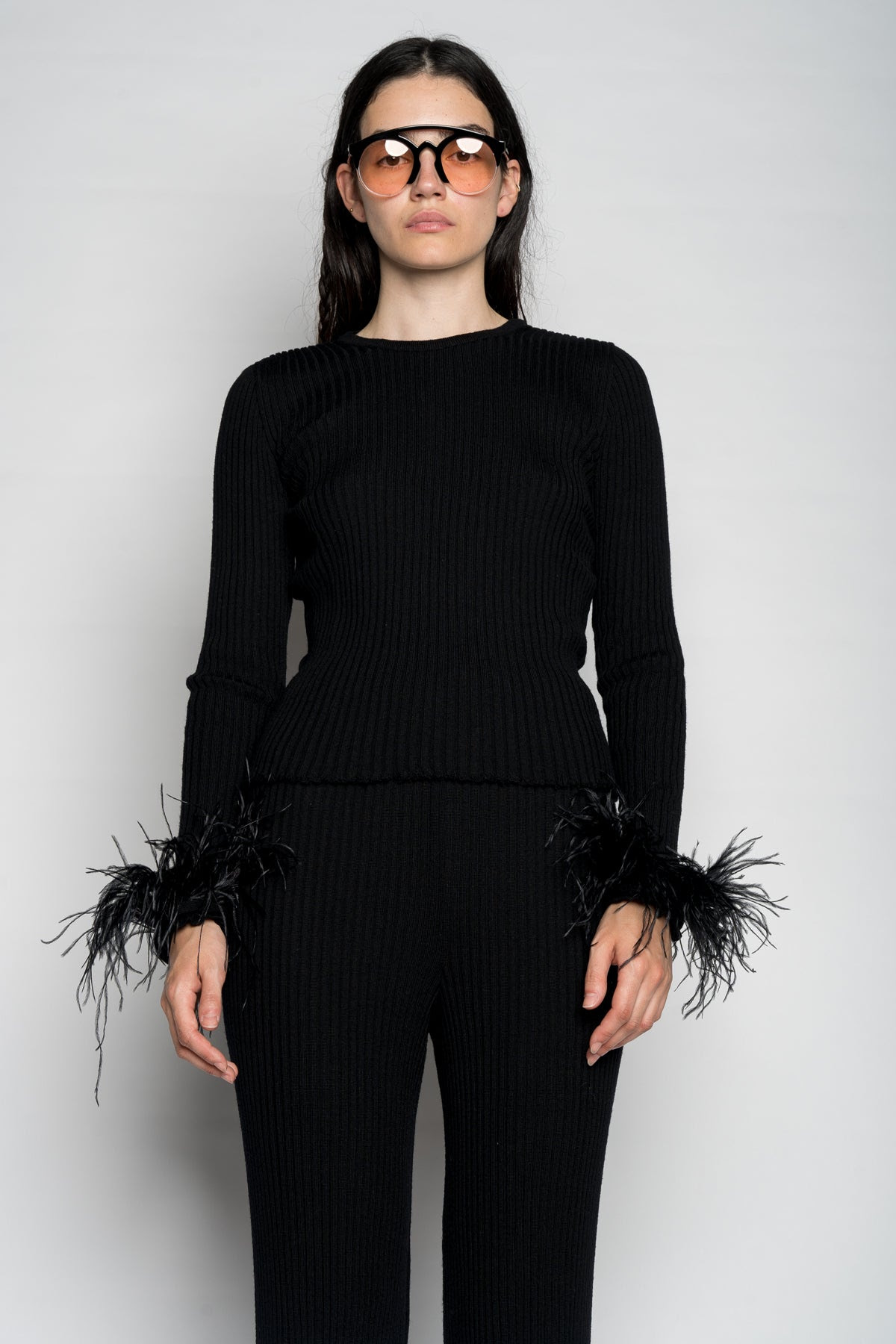 BLACK FITTED TOP WITH FEATHERS