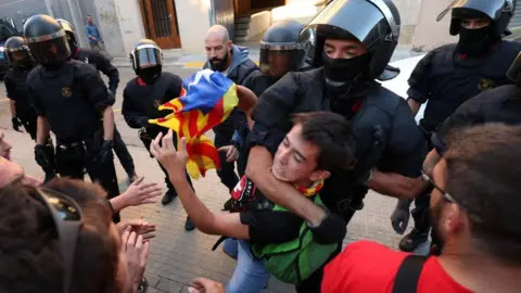 Catalonia referendum: Spanish raid deals blow to vote