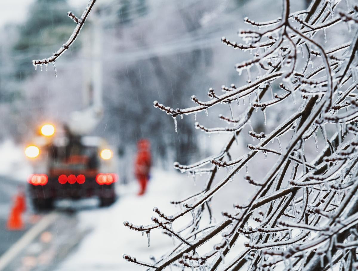 snowstorm ice on trees emergency vehicle