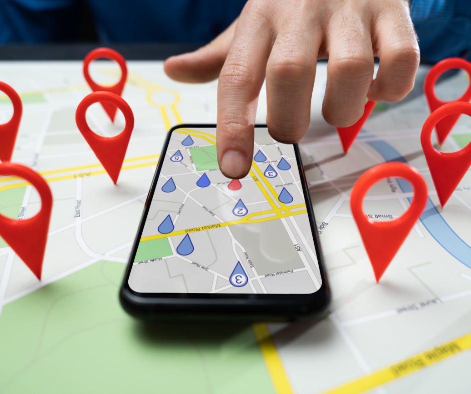 Map with a phone and pins of locations