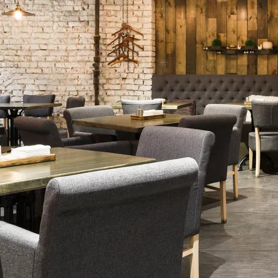 Contemporary restaurant dining space with custom furniture
