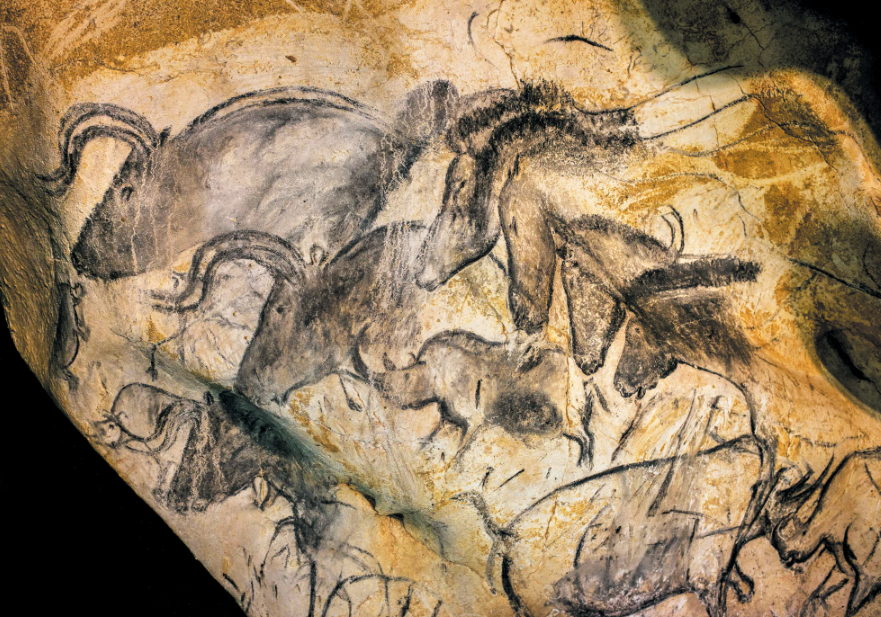 Cave drawings of horses and other animals.