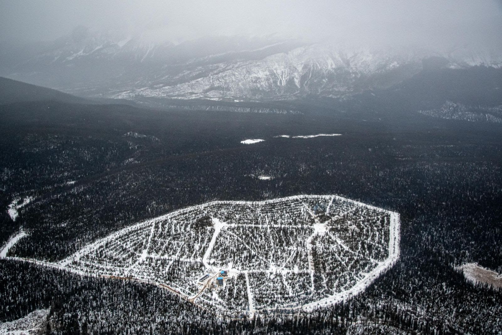 An aerial image showing the full footprint of the 65-hectare site and is very close to what the breeding centre will look like once complete. A wide clearing visible around the perimeter of the breeding centre is a 30-metre fireguard to mitigate the risk of wildfire.