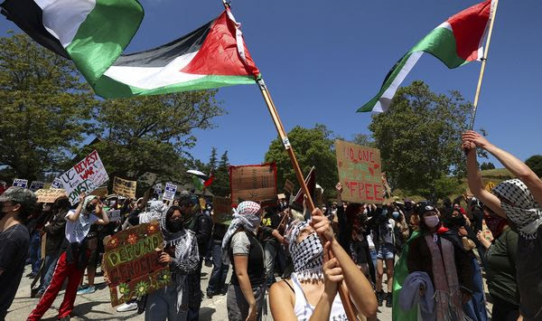 University of California, Santa Cruz graduate students and other academic workers begin a strike and are joined by UCSC students for Justice in Palestine, on Monday, May 20, 2024, in Santa Cruz, Calif. University of California President Michael Drake said the 10-campus system will consistently enforce bans on activist encampments, barriers and masking, moving to head off protest mayhem before the 2024-25 academic year. (Shmuel Thaler/The Santa Cruz Sentinel via AP, file)