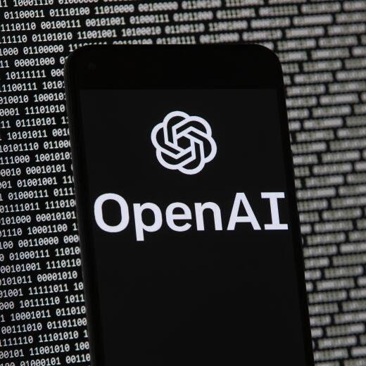 FILE - The OpenAI logo appears on a mobile phone in front of a computer screen with random binary data, March 9, 2023, in Boston. San Francisco-based OpenAI said Thursday, July 25, 2024, it is releasing a preview of the SearchGPT to a small group of users and publishers for feedback. (AP Photo/Michael Dwyer, File)