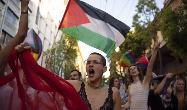 Protesters shout slogans against Israel&#x27;s military operation in Gaza Strip during the annual Pride parade, in Athens, Greece, June 15, 2024. At Pride events across the U.S, internal tensions over the ongoing war between Israel and Hamas in Gaza have seeped into the festivities, spurring boycotts and demonstrations at marches and exposing divisions within a movement firmly rooted in protest. (AP Photo/Michael Varaklas) **FILE**