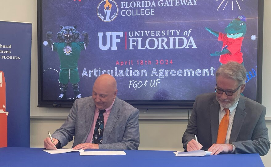 David Richardson, the dean of the UF College of Liberal Arts and Sciences, and Lawrence Barnett, president of Florida Gateway College, signed the agreement bringing the Going Gator initiative to the Lake City state college on Thursday, April 18, 2024.