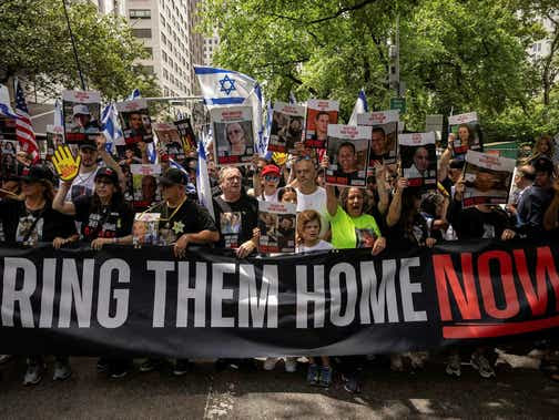 Family members of Israeli hostages march in New York, Sunday.