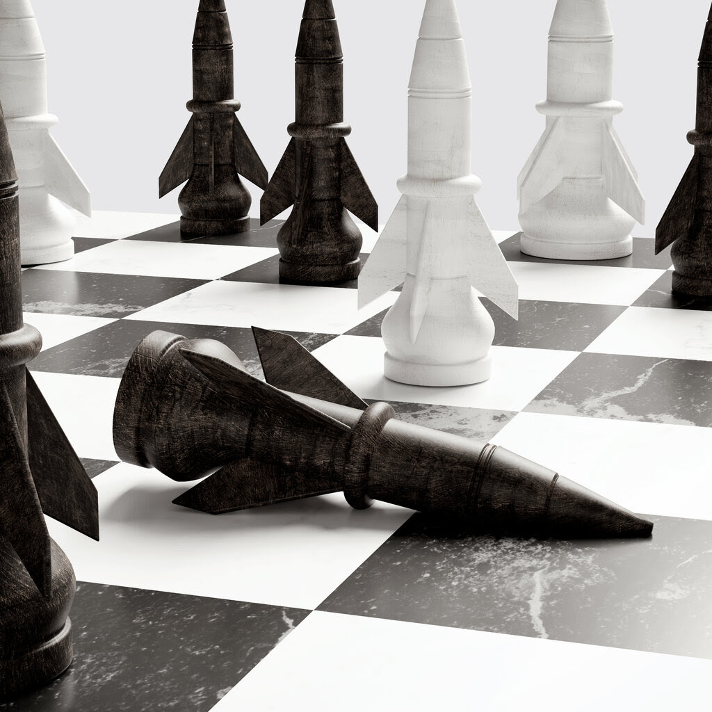 An illustration of nuclear warheads as chess pieces with one of the black pieces knocked over.