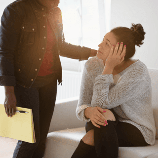 Mental health support professional connecting with an employee