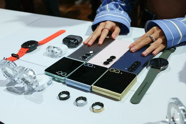 A visitor has a look at a display of Samsung products in Paris. AFP