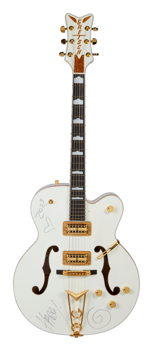 Harry Styles’ signed 1999 Gretsch White Falcon hollow body electric guitar