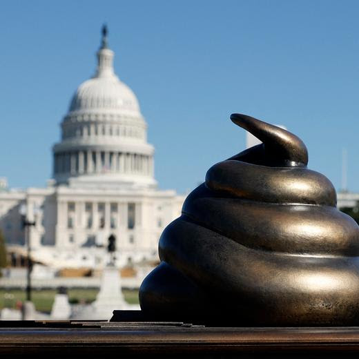 WASHINGTON, DC - OCTOBER 24: A satirical art installation that "honors" those who participated in the Jan 6, 2021 riot at the U.S. Capitol on the National Mall in on October 24, 2024 in Washington, DC. The temporary art installation depicts an emoji-style poop on top of then-Speaker of the House Nancy Pelosi’s desk. Kevin Dietsch/Getty Images/AFP (Photo by Kevin Dietsch / GETTY IMAGES NORTH AMERICA / Getty Images via AFP)