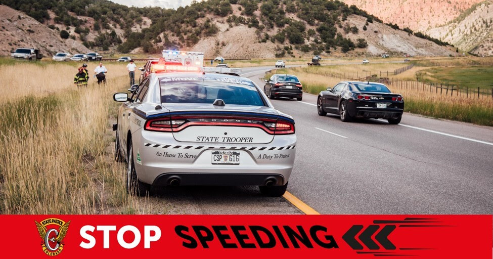 Patrol car on shoulder at a crash