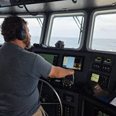 Person driving a boat