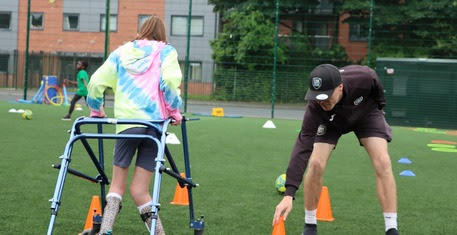 Disabled girl playing sports