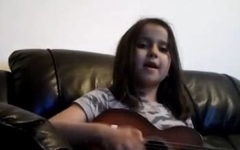 Sara Sharif plays guitar and sings in a video grab image released by Surrey Police