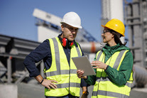 Engineers discussing at an industrial facility