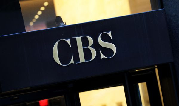 This Thursday, Dec. 6, 2018, file photo shows the CBS logo at the entrance to its headquarters, in New York. (AP Photo/Mark Lennihan, File) **FILE**