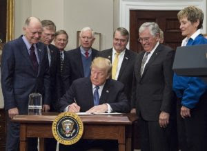 1200px Rep. Brooks joins President Trump at the White House for the signing of a space policy directive. 38994253481