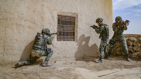 Chinese troops simulating a raid during a 'capture and annihilation' training exercise on April 13. [Chinese Ministry of Defence]