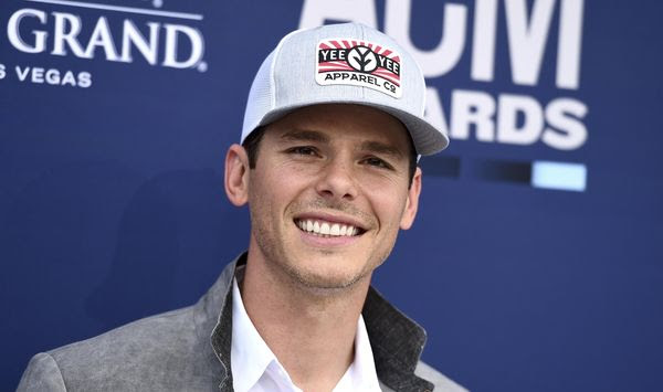 In this April 7, 2019, file photo, Granger Smith arrives at the 54th annual Academy of Country Music Awards at the MGM Grand Garden Arena, in Las Vegas. Smith said that his youngest son, River Kelly Smith, has died after an undisclosed accident. In a statement put out Thursday, June 6 through his label, Smith said that after doctors were unable to revive him, the family decided to donate his organs to other children. (Photo by Jordan Strauss/Invision/AP, File)