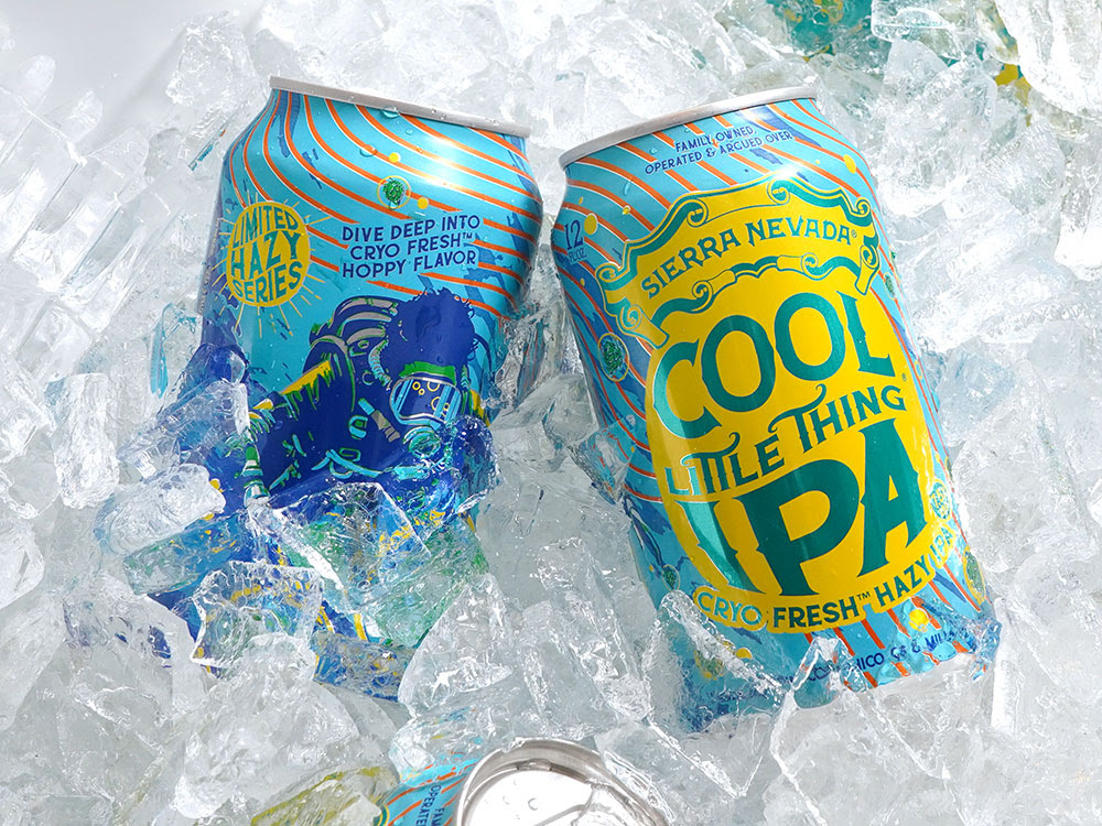 Two cans of Cool Little Thing in an icy cooler