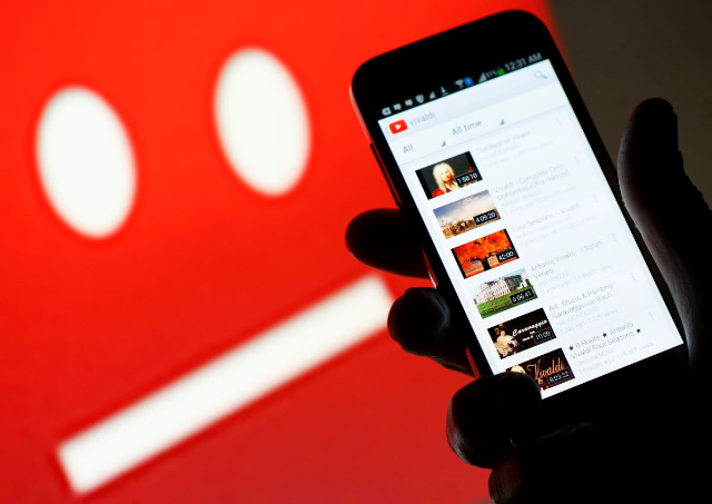 A picture illustration shows YouTube on a cell phone in June 2014. REUTERS/Dado Ruvic